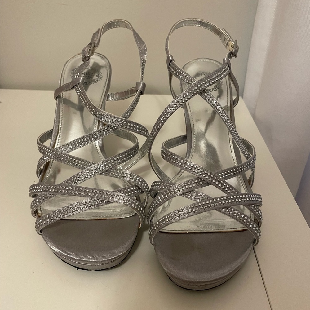 Silver sparkly high heels in a Size 7